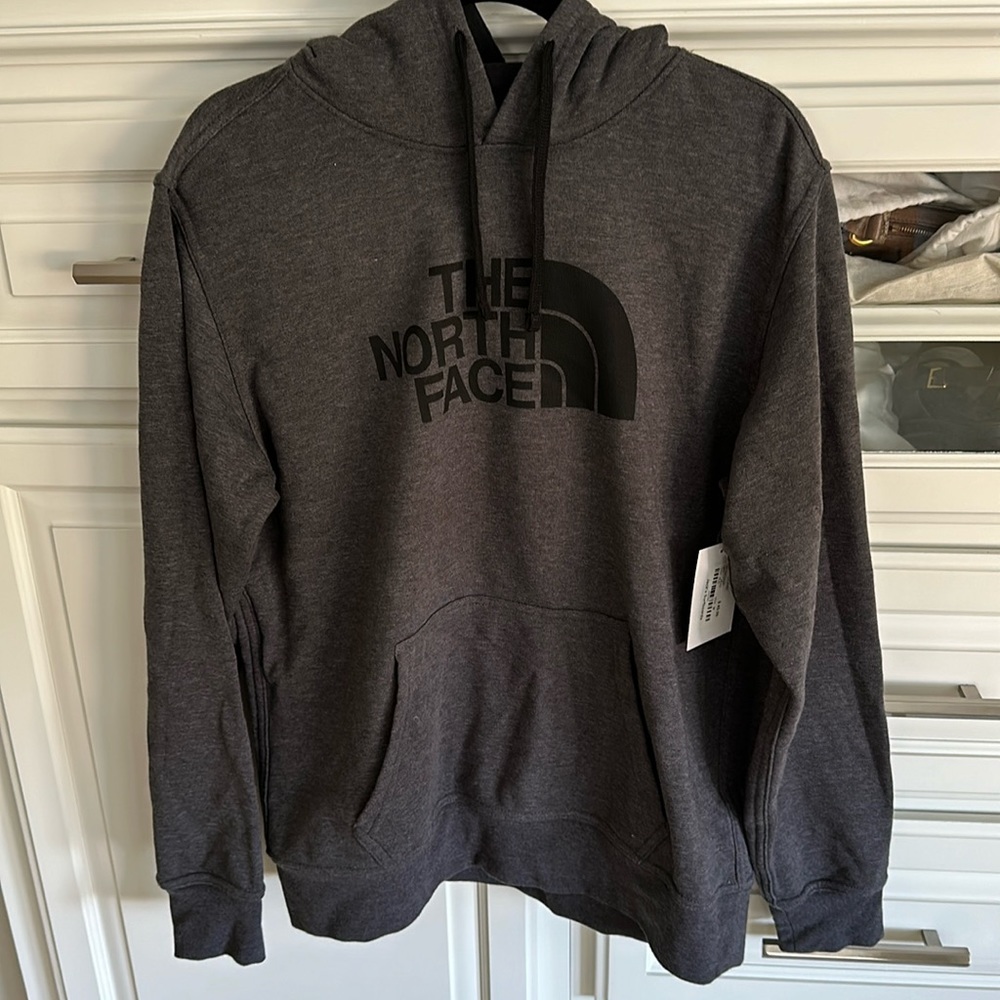 The NorthFace man’s gray hoodie size Medium, brand new tags attached